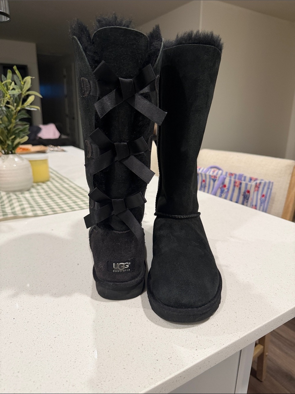 Black Ugg bow boots